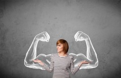 Young woman with strong muscled arms